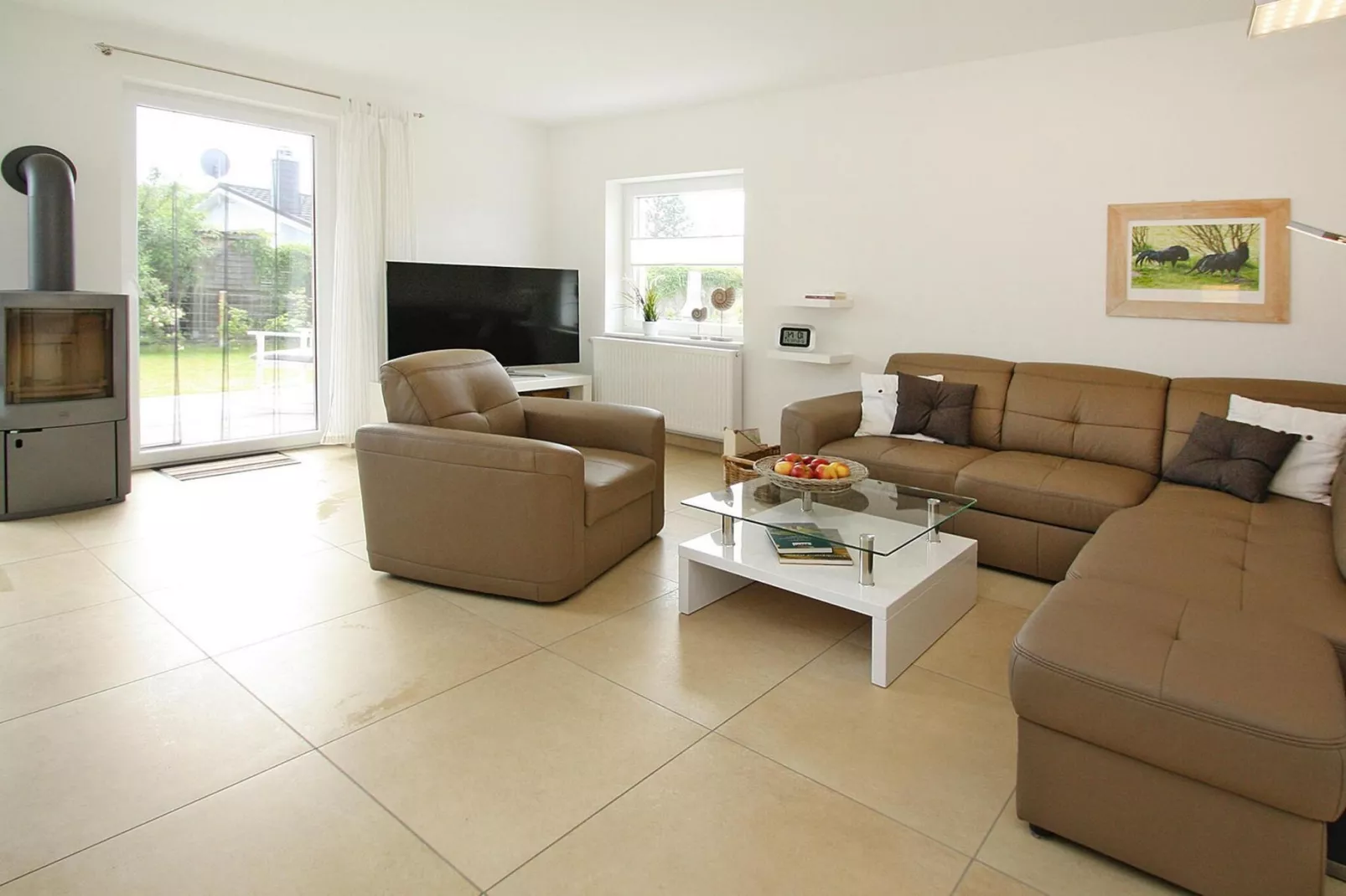 Ferienhaus Min Kaat-Woonkamer