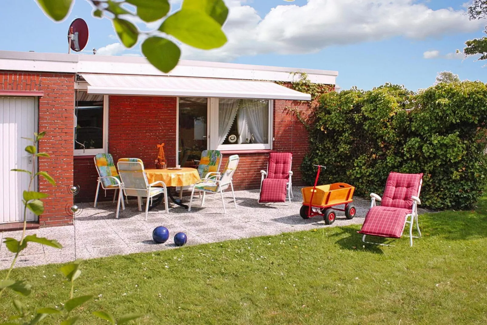 Ferienbungalow Klönsnack in Dornumersiel-Tuinen zomer