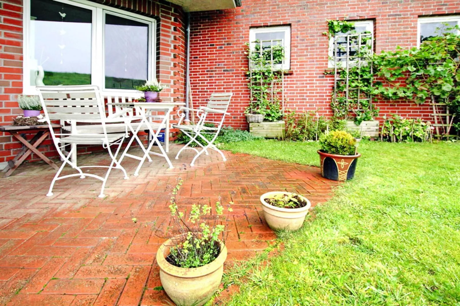 Ferienwohnung Kapitänskajüte-Tuinen zomer