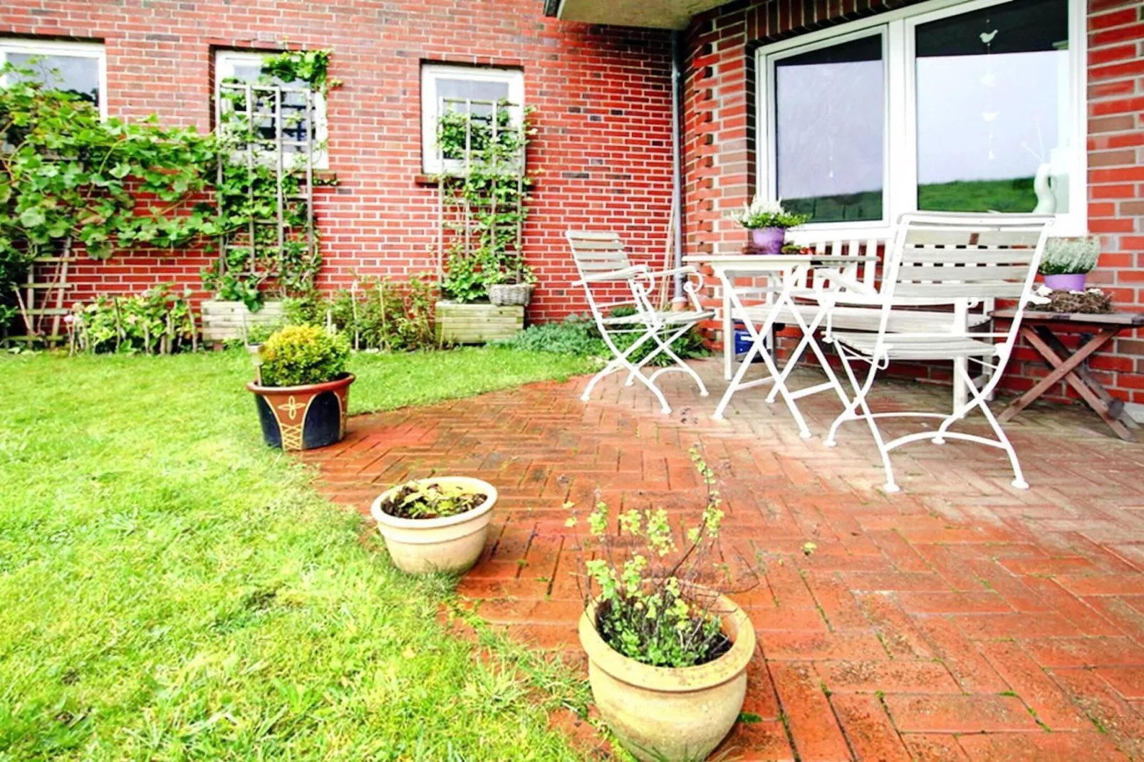 Ferienwohnung Kapitänskajüte-Tuinen zomer
