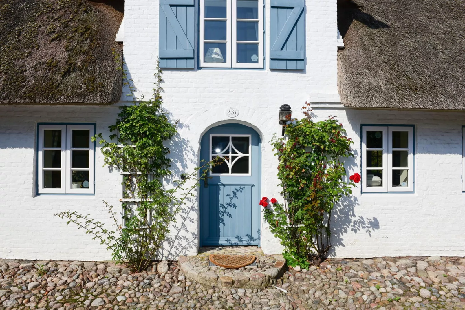 Doppelhaus in Oldsum - Haus 2-Buitenkant zomer