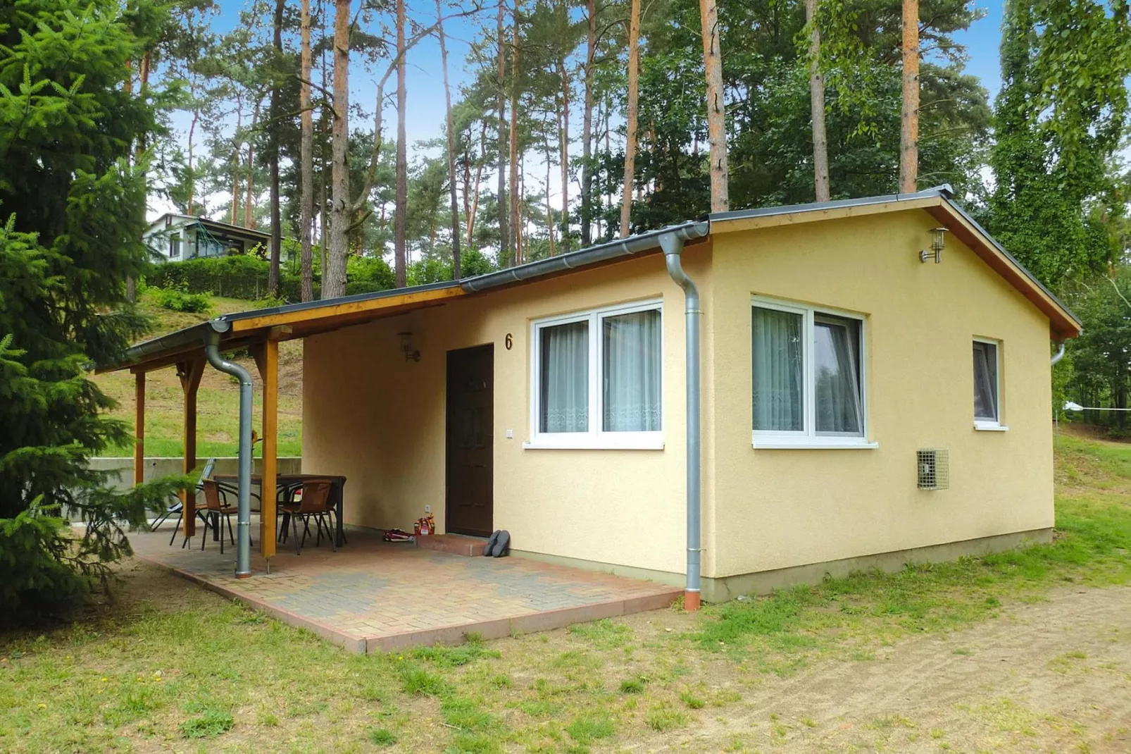 Bungalow deluxe 48 qm-Buitenkant zomer