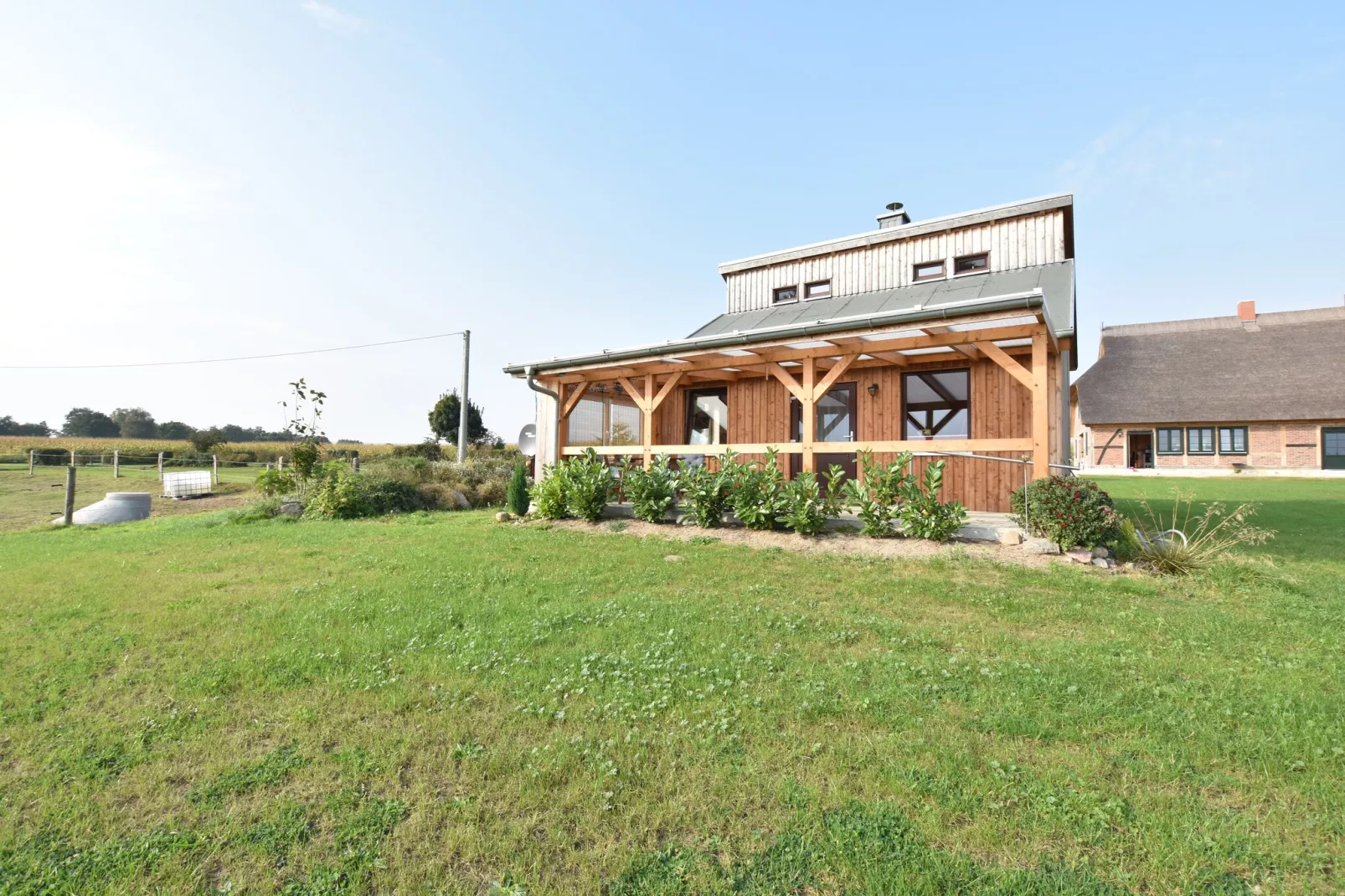 Ferienhaus Am See mit Kamin-Tuinen zomer