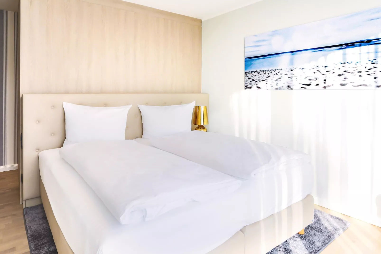 Apartments im MAREMÜRITZ Yachthafen Resort & Spa / Fortuna Suite Müritzblick 3 Personen-Slaapkamer