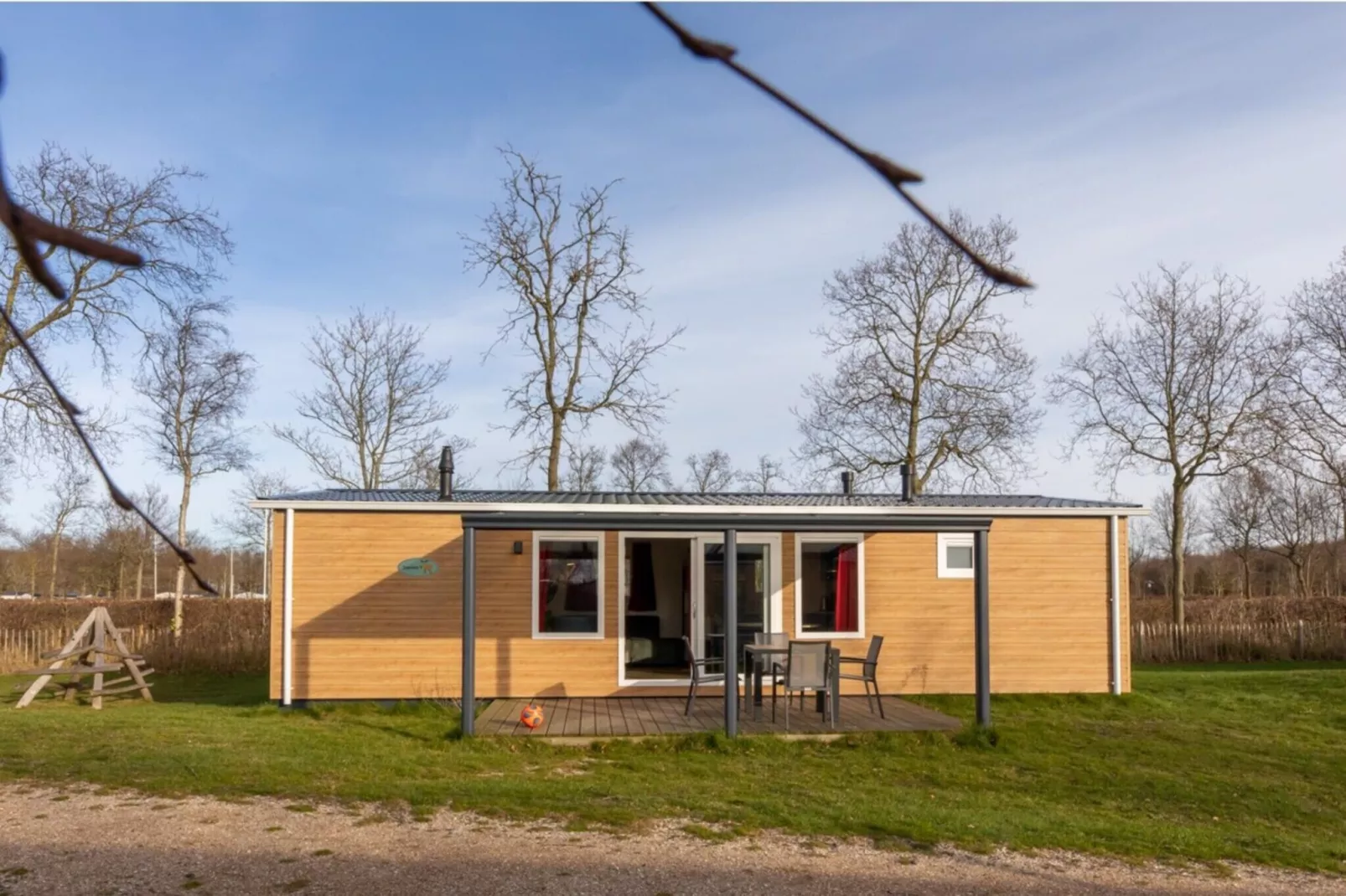 Chalet - Camping de Duinhoeve 'Bosdier'-Buitenkant zomer