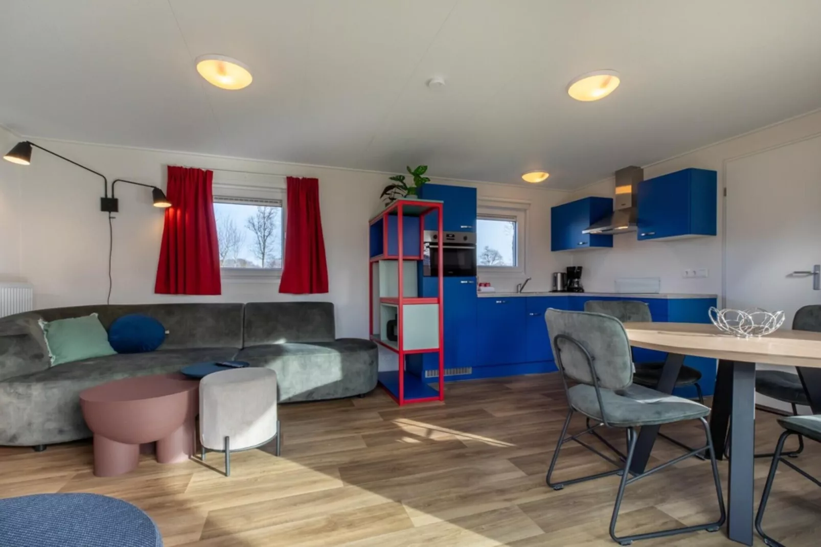 Chalet - Camping de Duinhoeve 'Bosdier'-Woonkamer