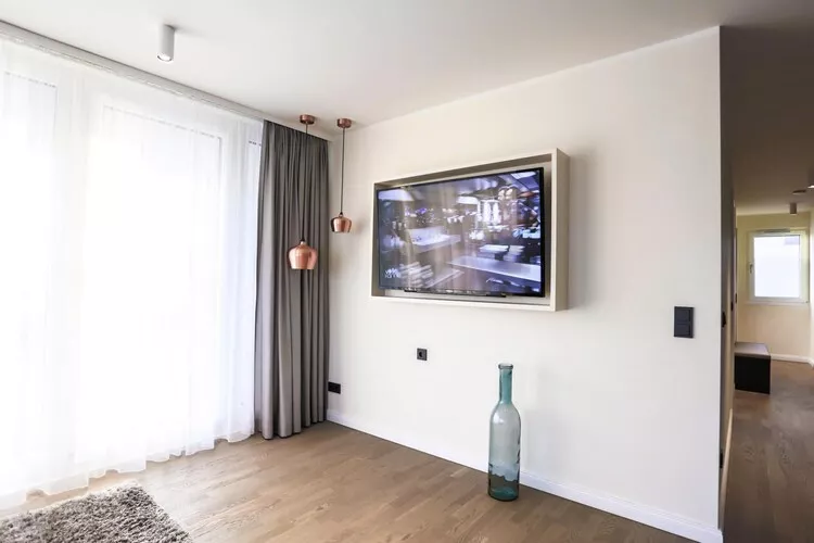 Apartments im MAREMÜRITZ Yachthafen Resort & Spa / Anker Penthouse Suite 3 Personen-Woonkamer