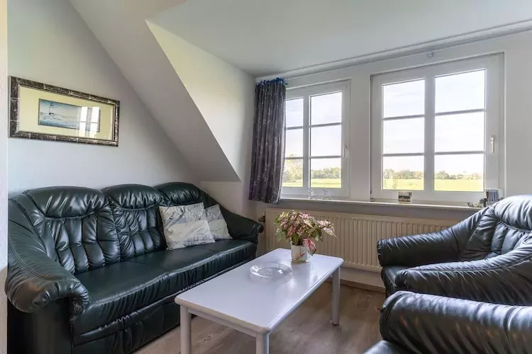 Ferienwohnung bi uns to Hus Tönning-Woonkamer