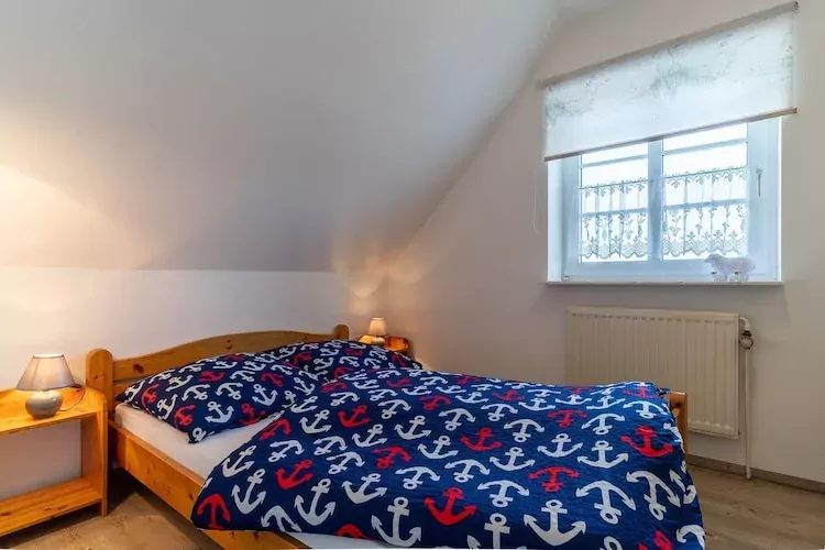 Ferienwohnung bi uns to Hus Tönning-Slaapkamer