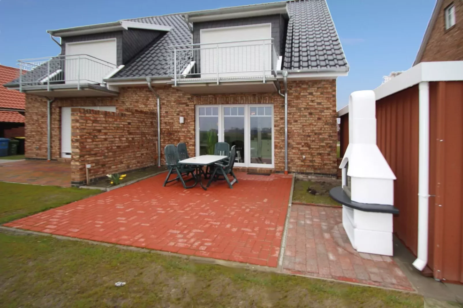 Gemütliche Nordsee-Wohnung in Neßmersiel mit Garten und Feldblick