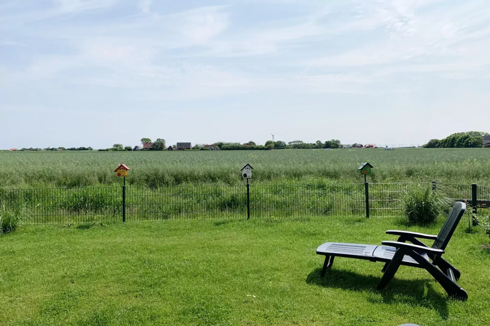 Gemütliche Nordsee-Wohnung in Neßmersiel mit Garten und Feldblick-Uitzicht