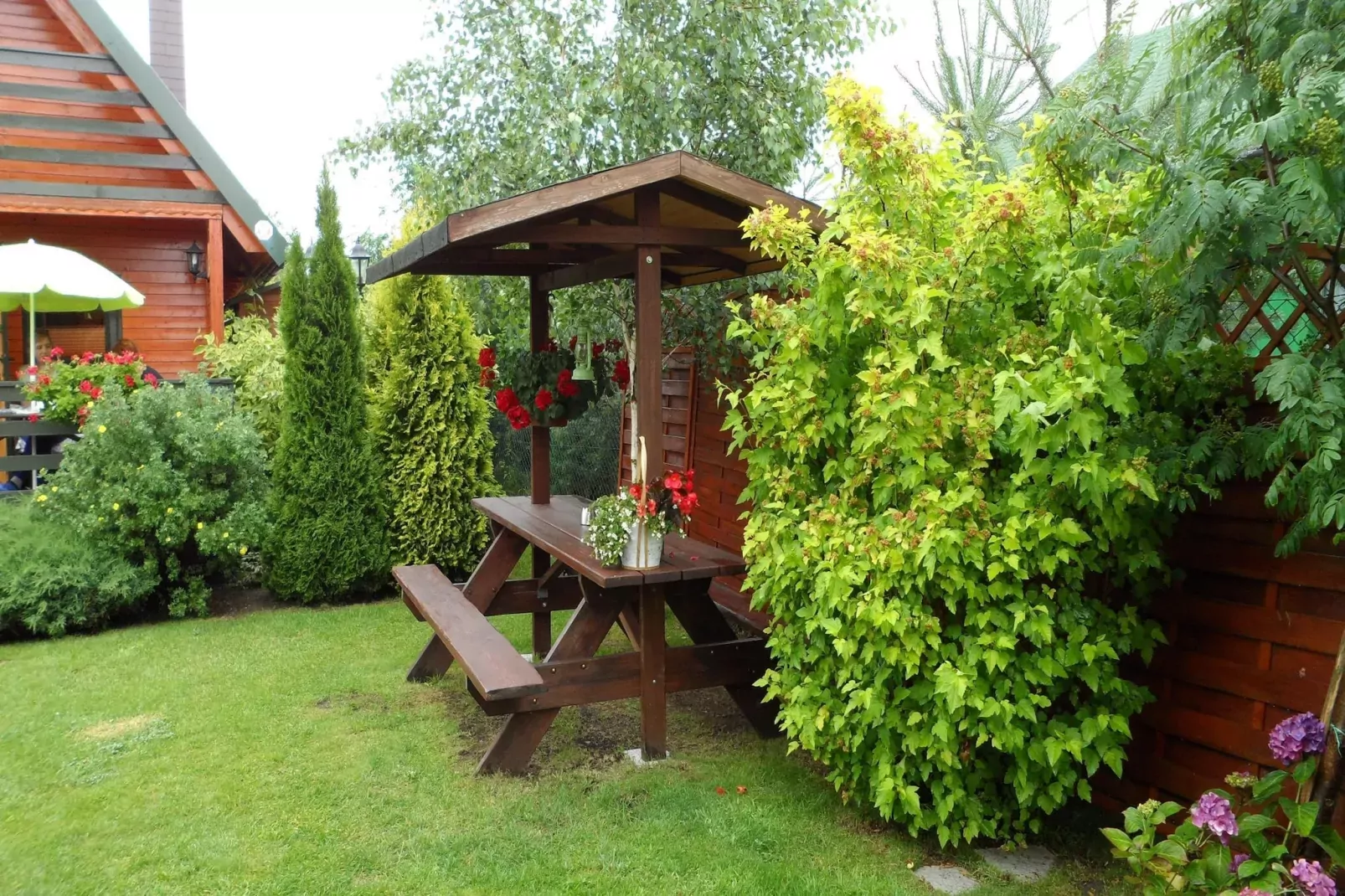 Domki letniskowe dla 6 osób Sarbinowo-Tuinen zomer