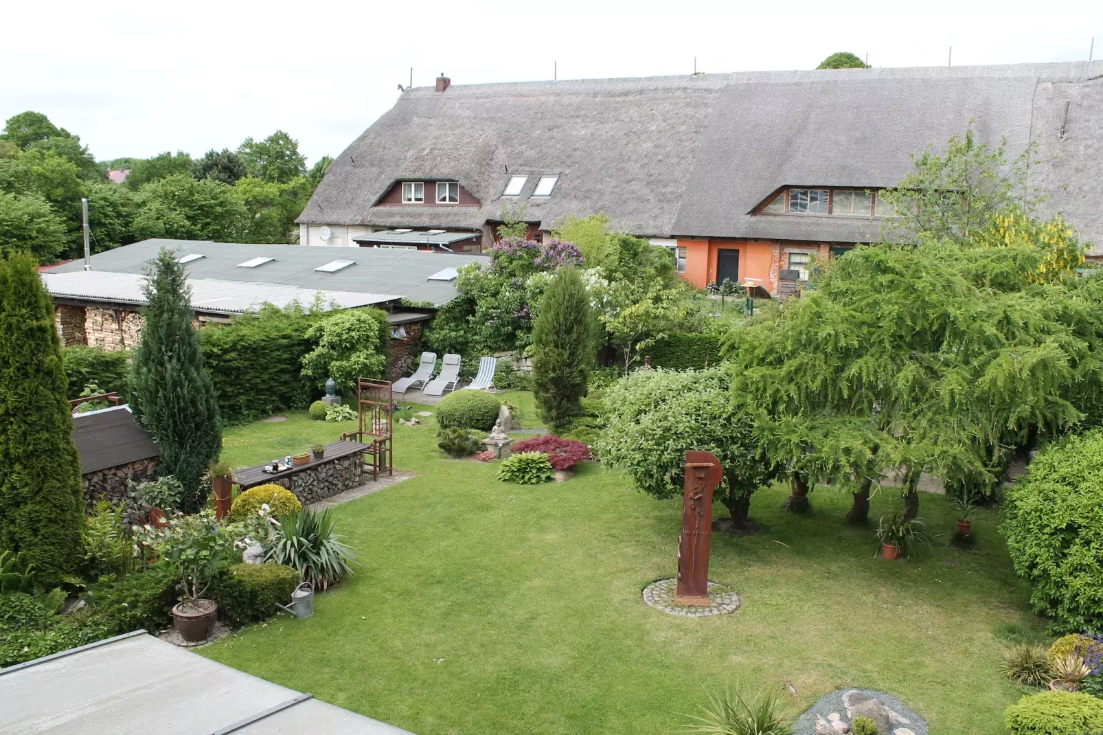 Strandnahe Ferienwohnung Betty mit großem Garten-Uitzicht zomer