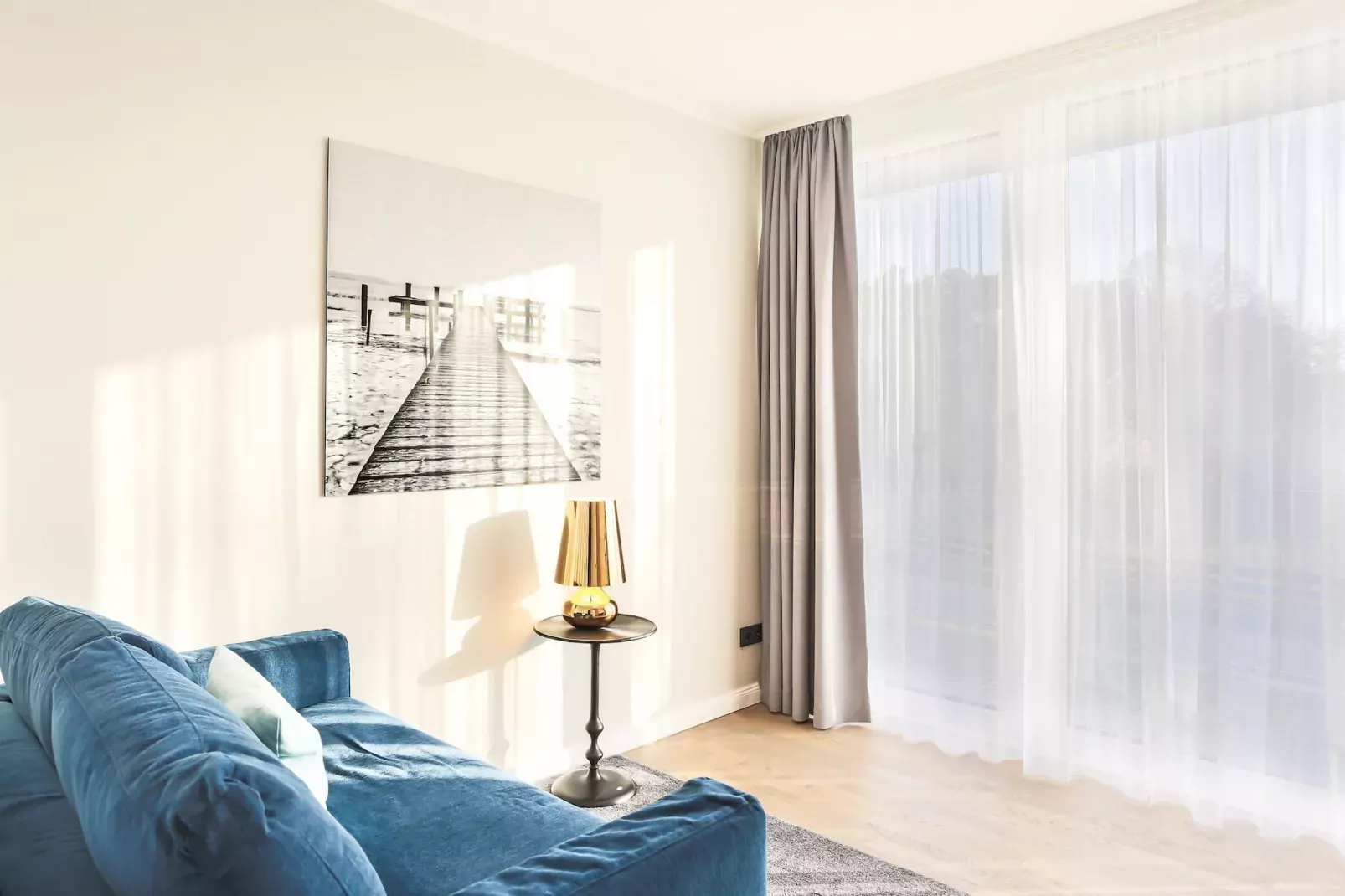 Apartments im MAREMÜRITZ Yachthafen Resort & Spa / Fortuna Suite Müritzblick 3 Personen-Woonkamer