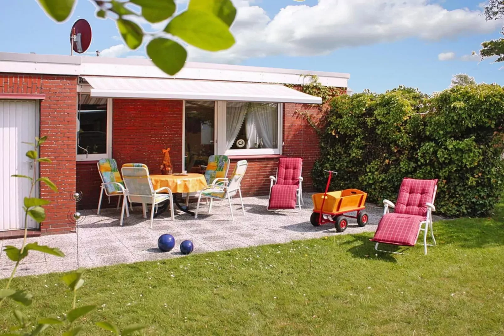 Ferienbungalow Klönsnack in Dornumersiel-Tuinen zomer