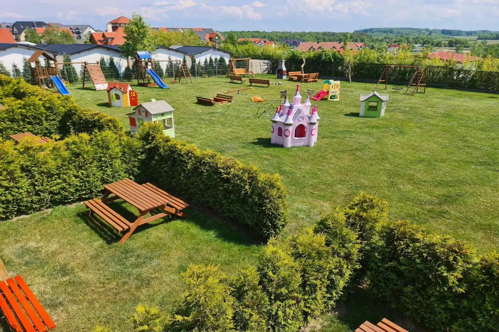 Domki parterowe Jarosławiec-Tuinen zomer
