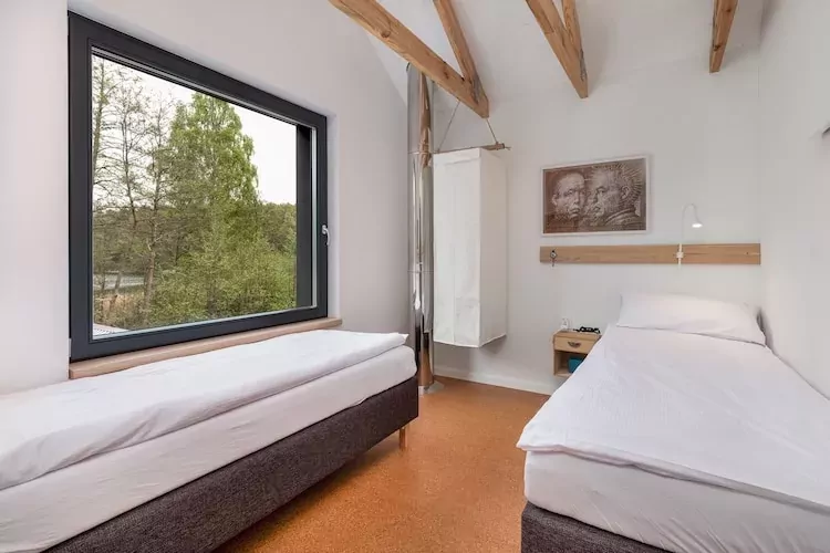 Dom wakacyjny dla 2 osób nad jeziorem Wisełka-Slaapkamer
