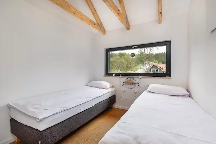 Dom wakacyjny dla 2 osób nad jeziorem Wisełka-Slaapkamer