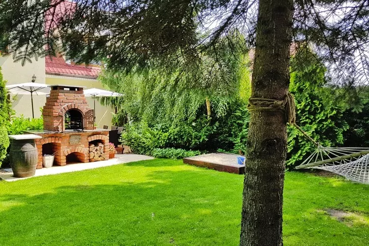 Luksusowy dom wakacyjny dla 10 osób w Trzęsaczu-Tuinen zomer