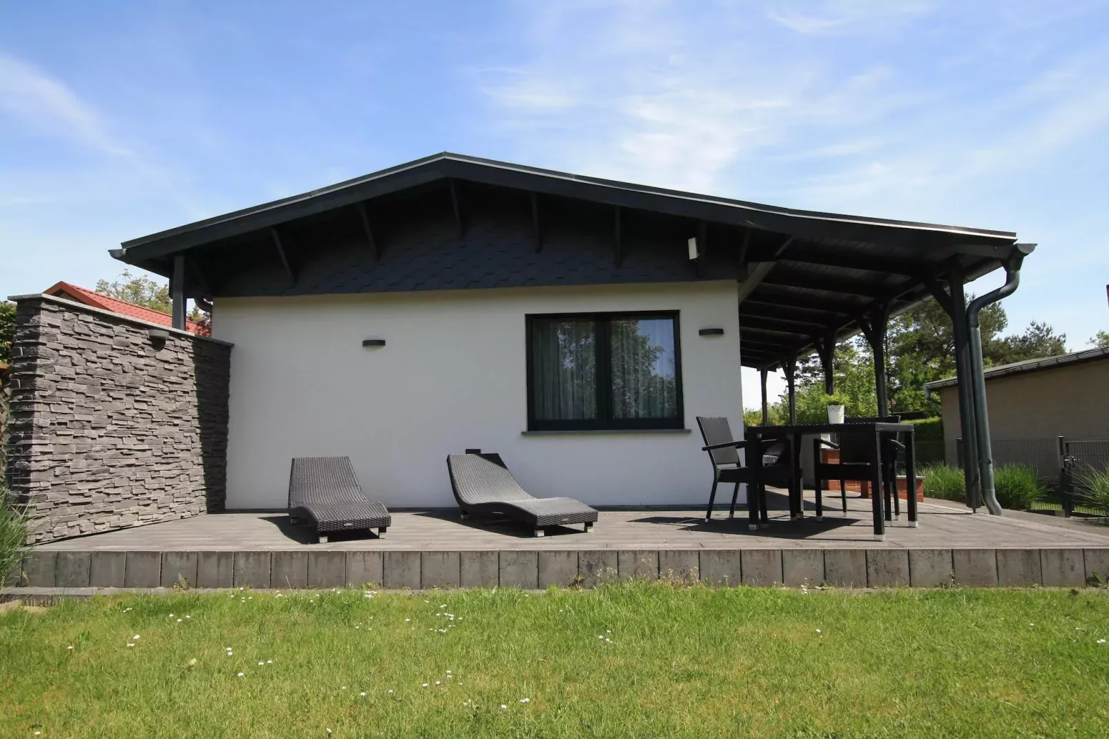 Ferienhaus mit Wasserblick 2 Pers-Buitenkant zomer