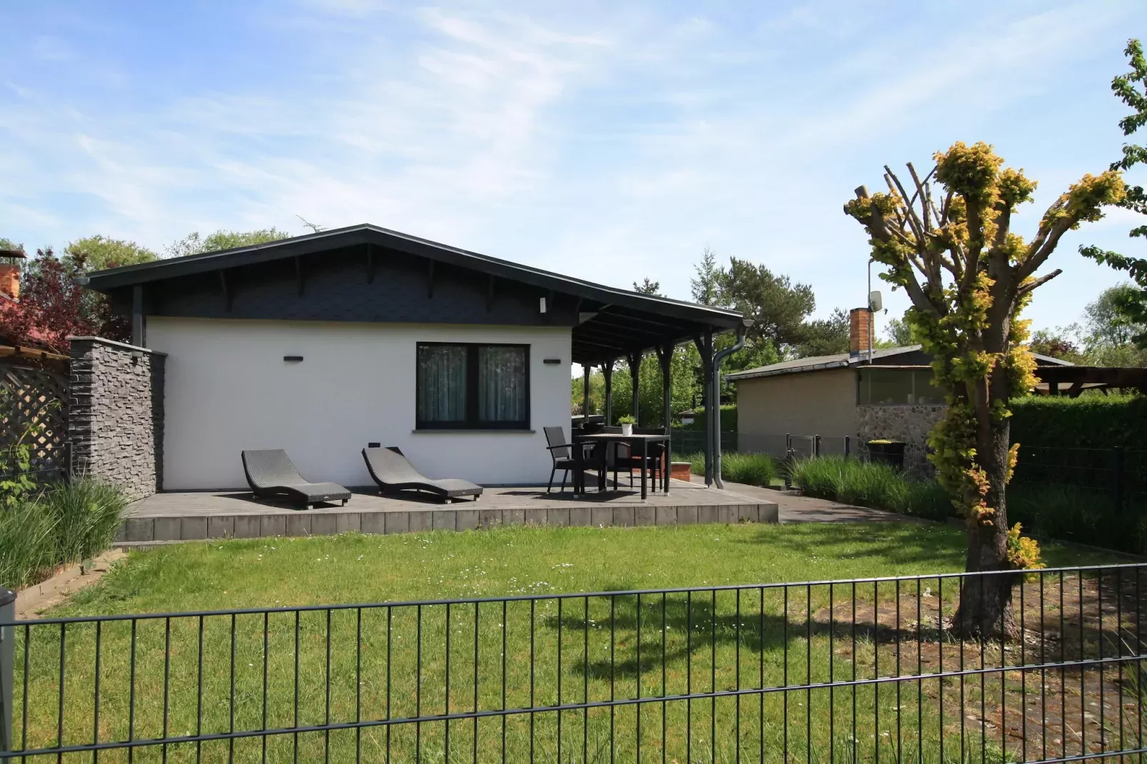Ferienhaus mit Wasserblick 2 Pers-Buitenkant zomer