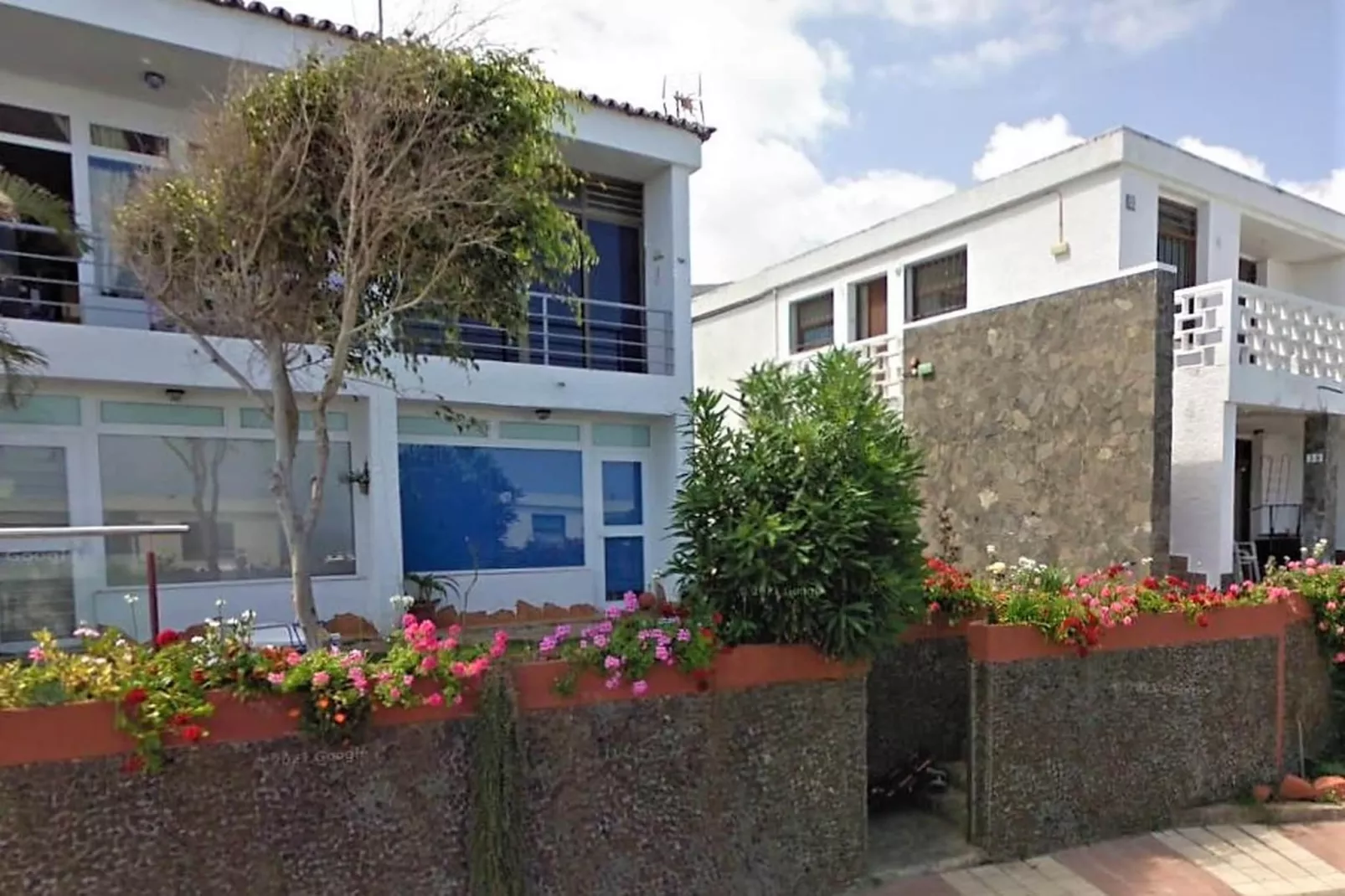 Apartamento en playa Las Carmenes-Buitenkant zomer