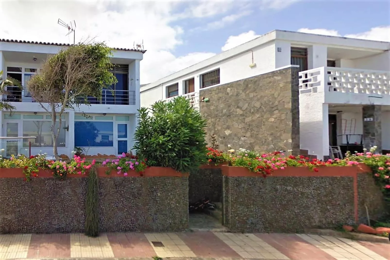 Apartamento en playa Las Carmenes-Buitenkant zomer