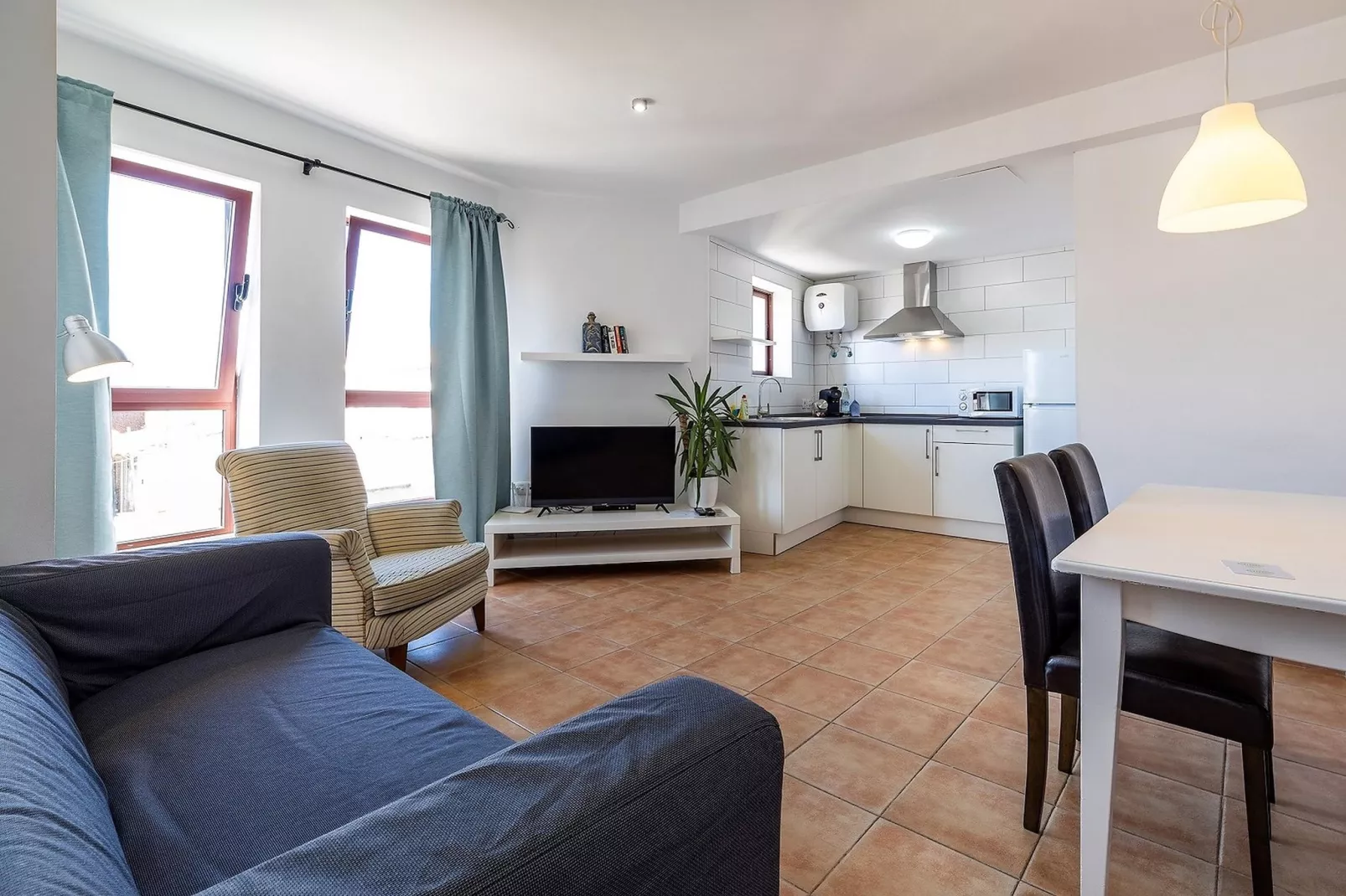 Apartamento en playa Las Carmenes-Woonkamer