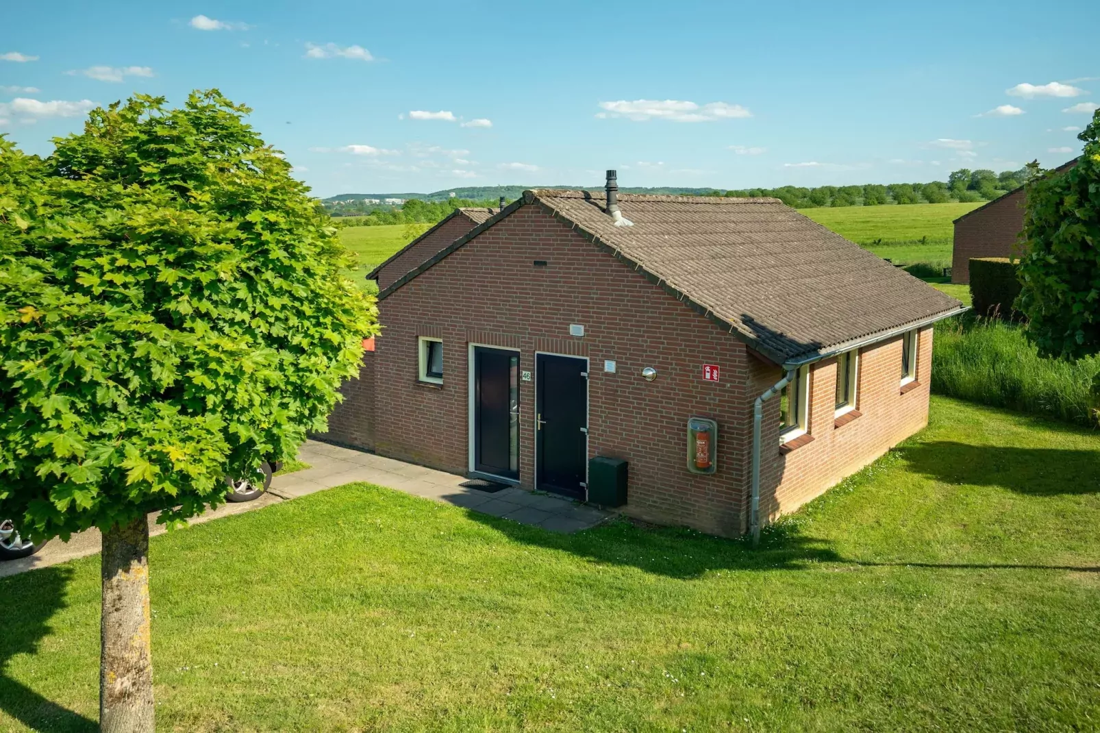 Vakantiepark Reevallis 2-Buitenkant zomer