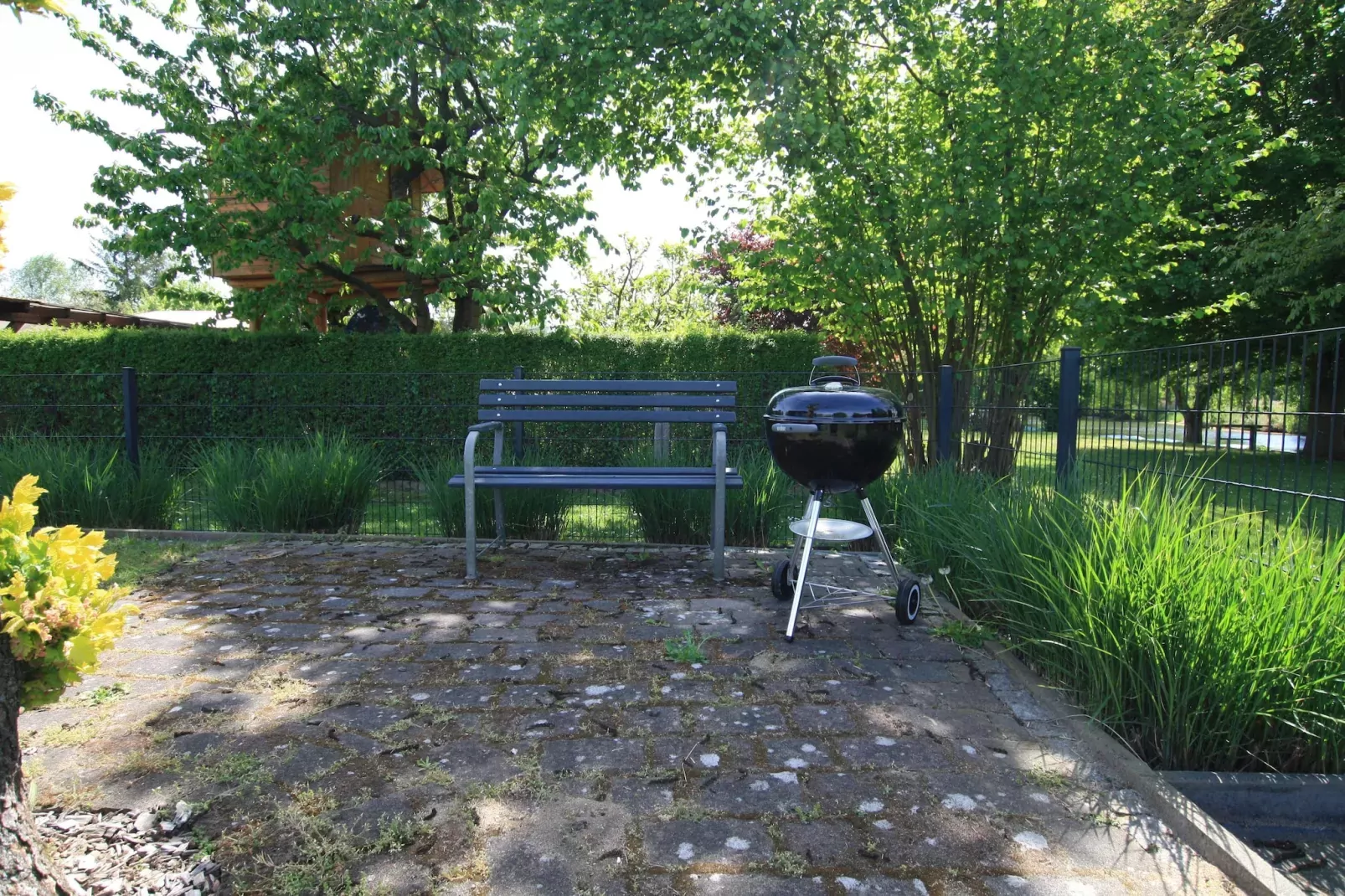 Ferienhaus mit Wasserblick 2 Pers-Tuinen zomer