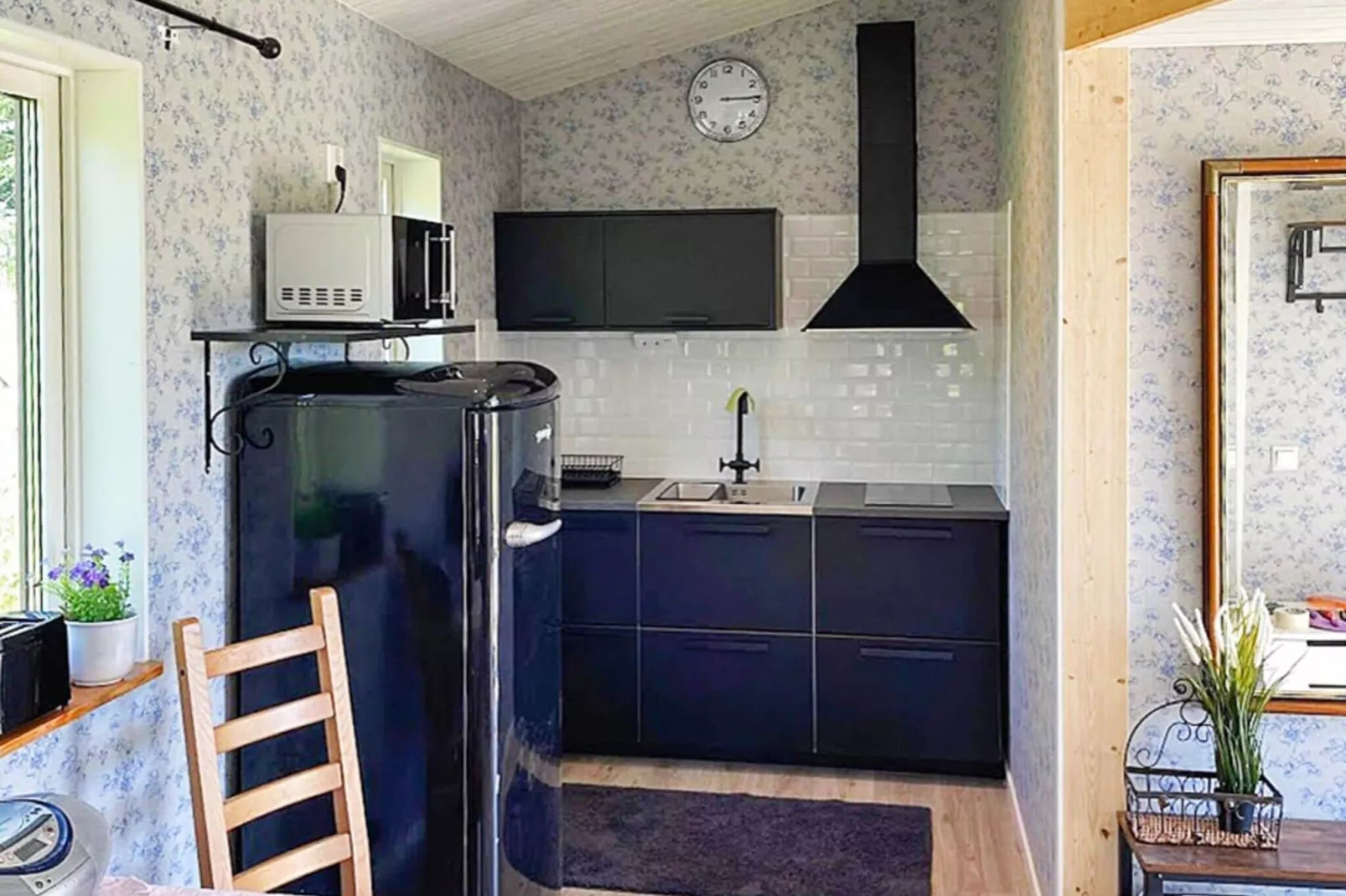 Romantisch vakantiehuis in Vitaby met terras-Binnen