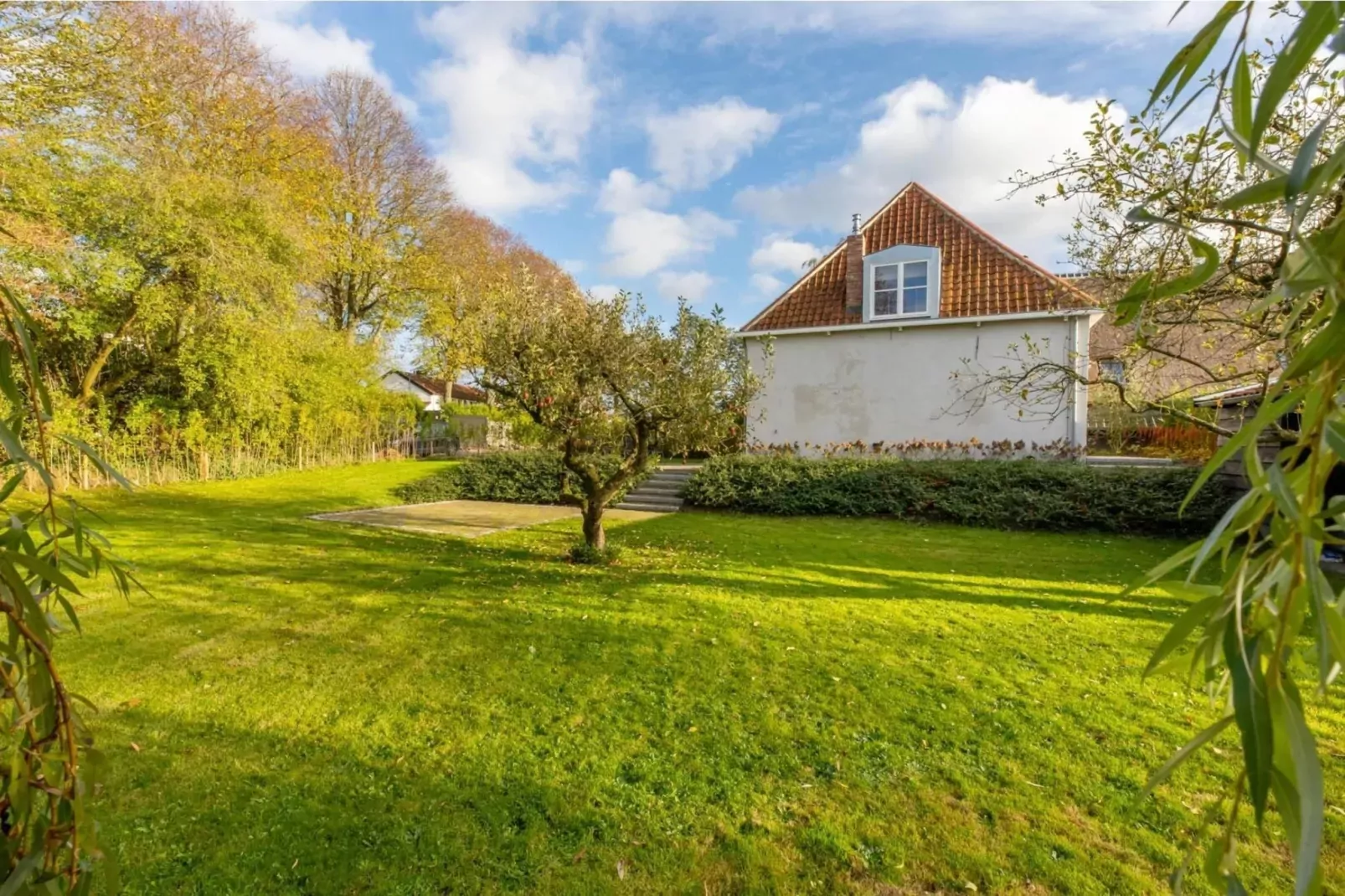 Vakantiehuis 'Boerderij Molenhof' - Stationsweg 5  Heinkenszand-Tuinen zomer