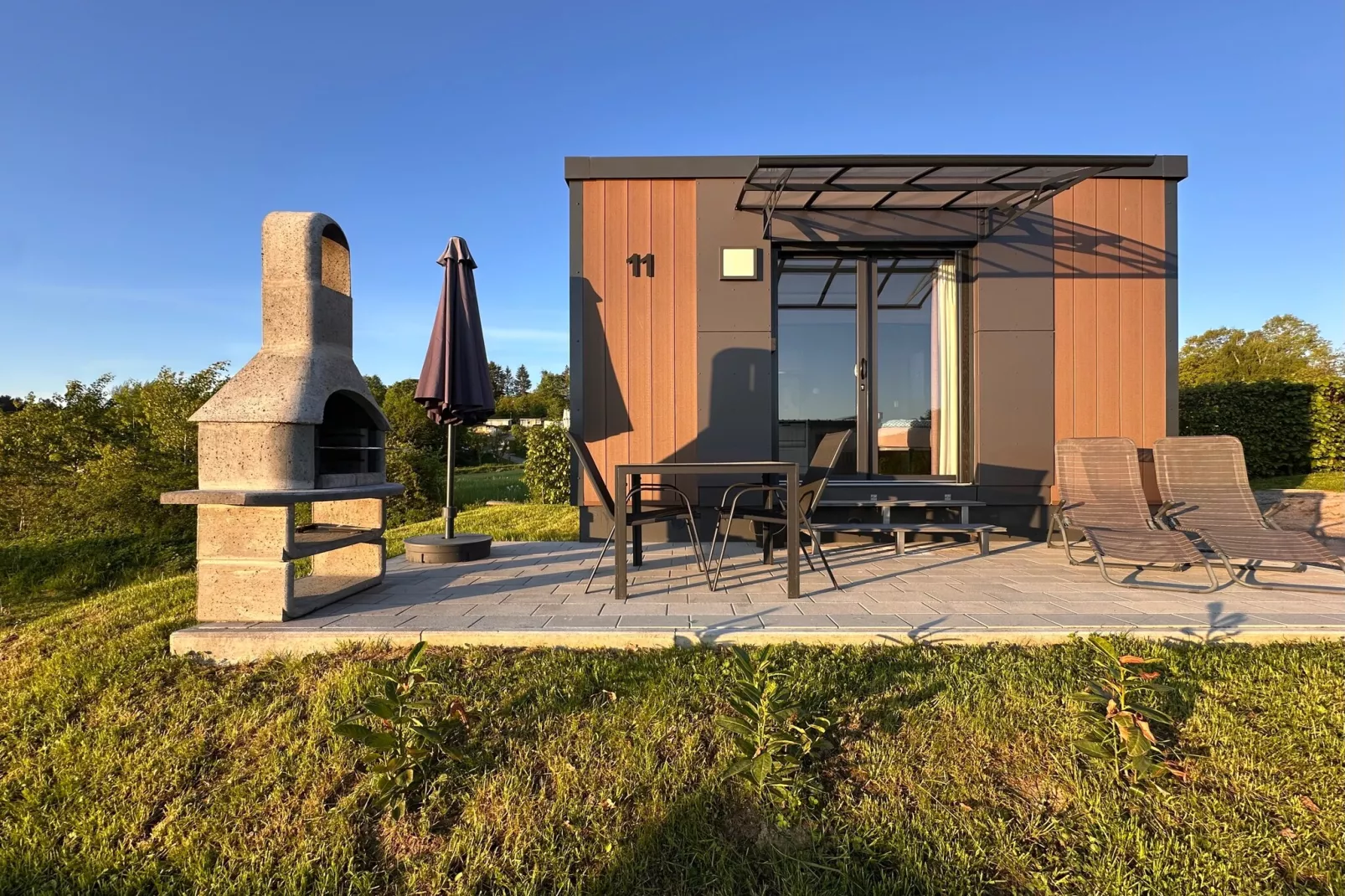 FERIENDORF SEEBLICK - Tiny Chalet am Eixendorfer See-Buitenkant zomer