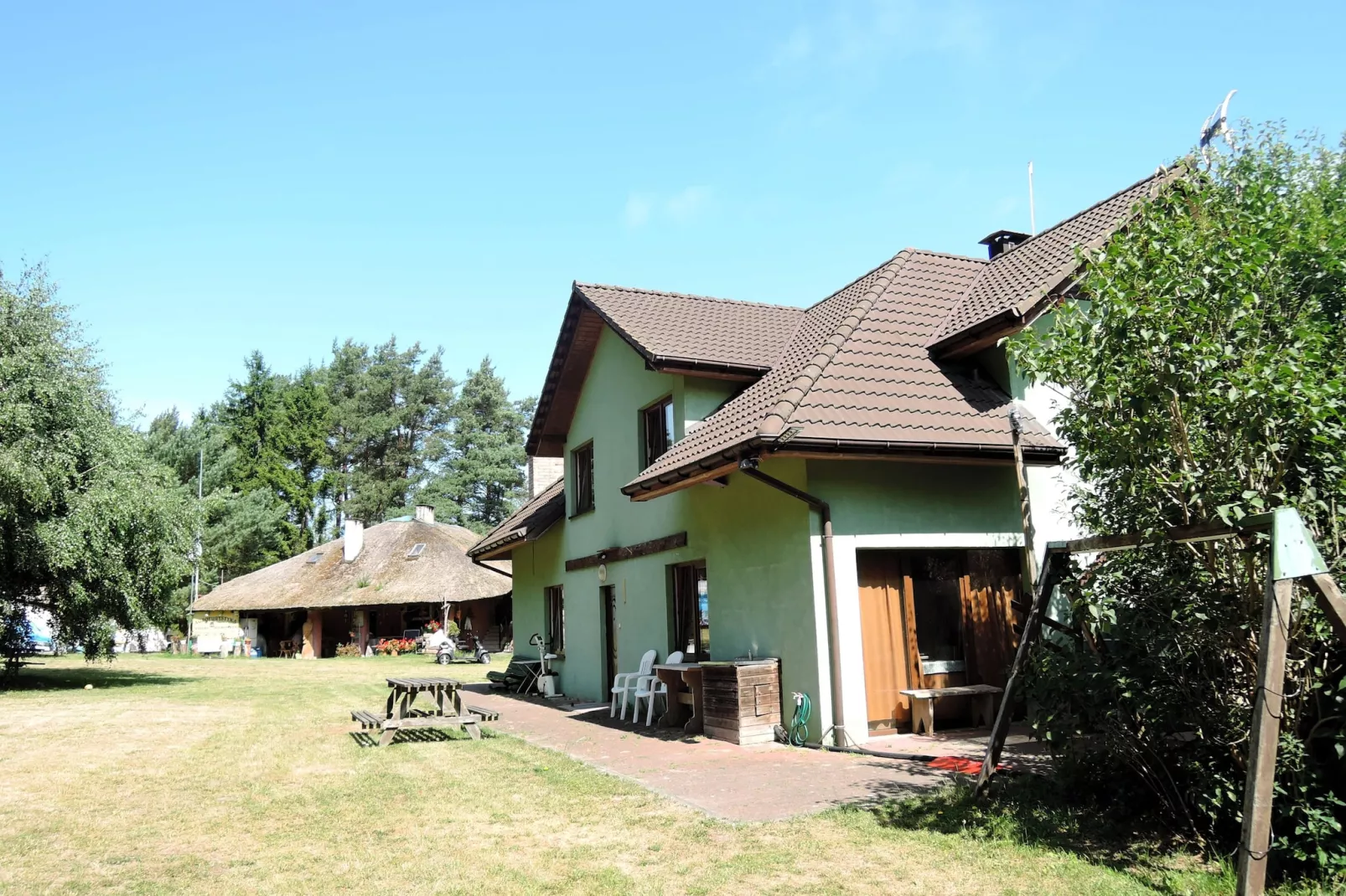 Pod świerkami pokój nr 4 dla 4 osób - Buitenkant zomer