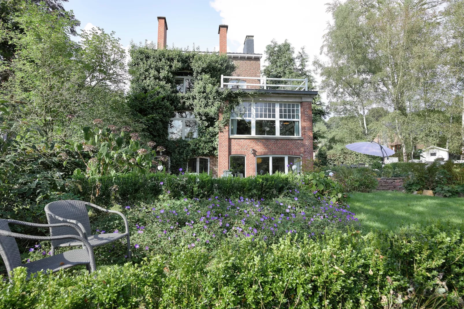 La Villa Louise-Tuinen zomer