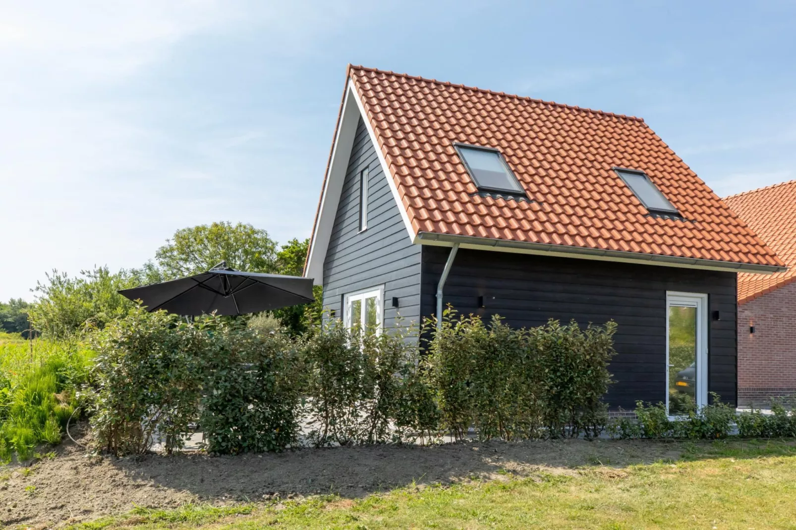 Huisje huren in Zeeland  De Strandloper Westkapelle - Charley Tooropstraat 1a  Strand & Natuur-Buitenkant zomer