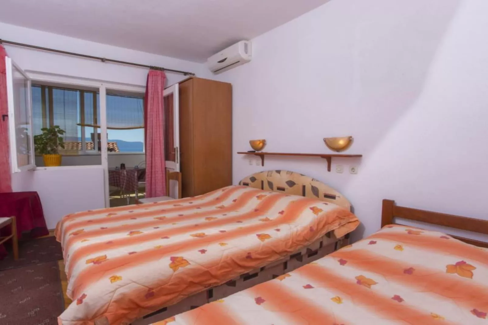Triple Room with Private Balcony (A3)-Slaapkamer