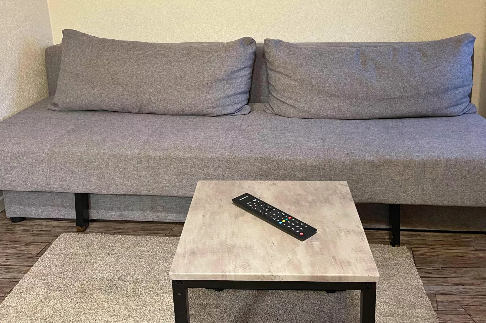 F001 Apartment mit Doppelbett-Woonkamer