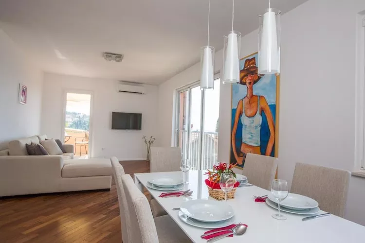 Apartments Nina - Two-Bedroom Apartment with Balcony and Sea View (Orašac)-Eetkamer