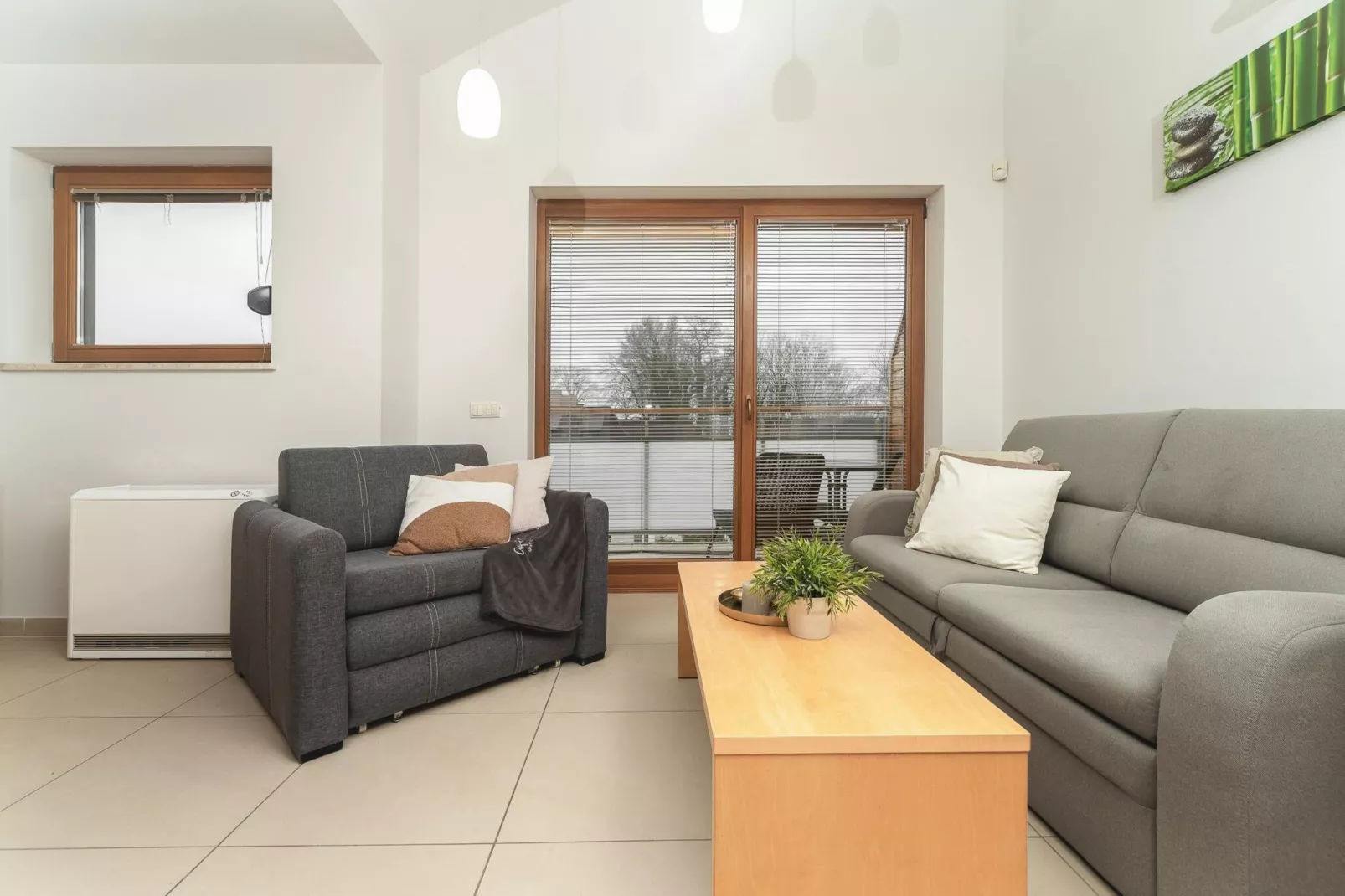 Apartament 2-poziomowy Bałtycka Rewal-Woonkamer