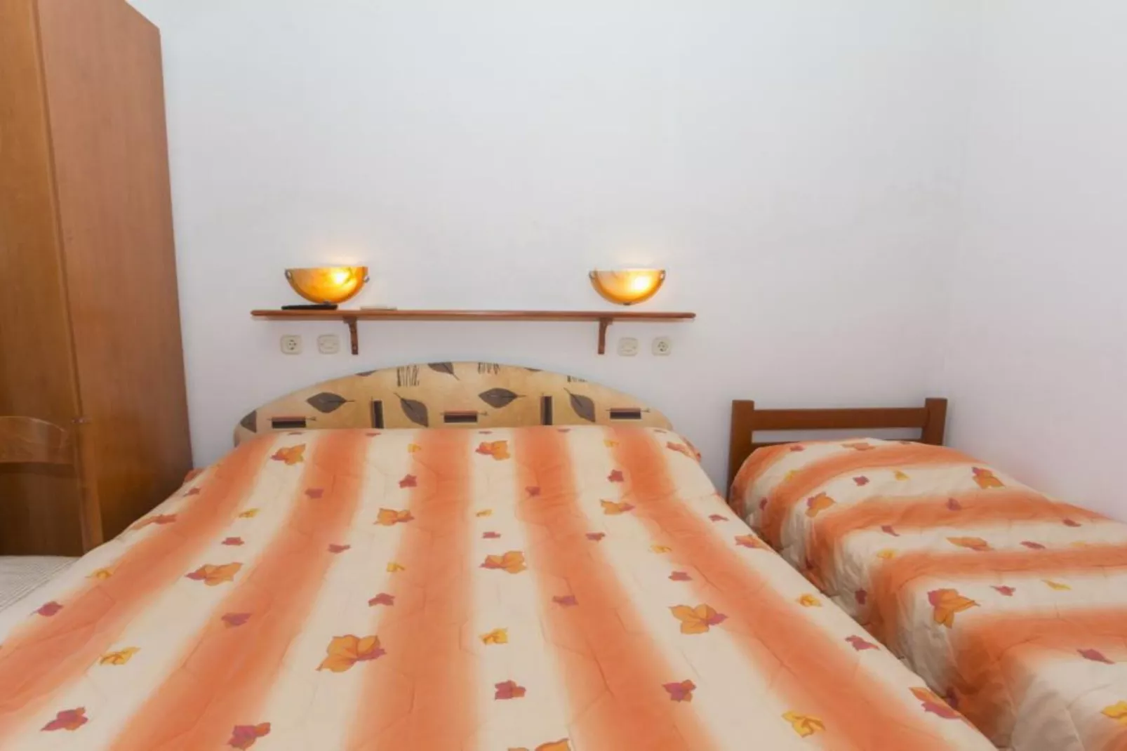 Triple Room with Private Balcony (A3)-Slaapkamer
