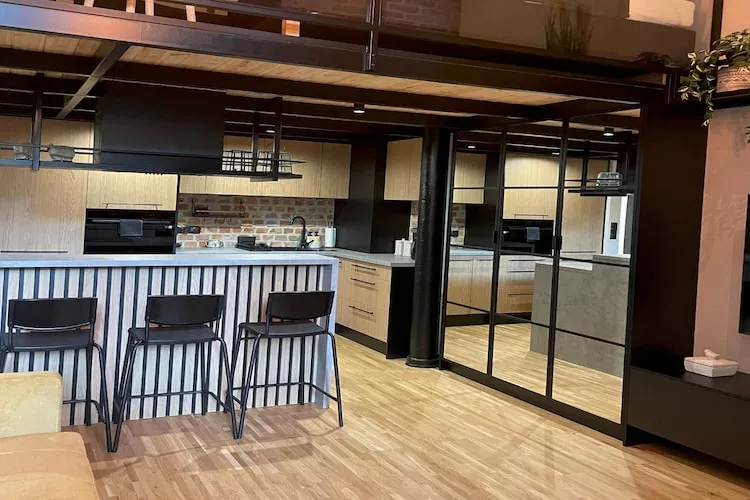 Komfortowy apartament Loft w Łodzi-Woonkamer