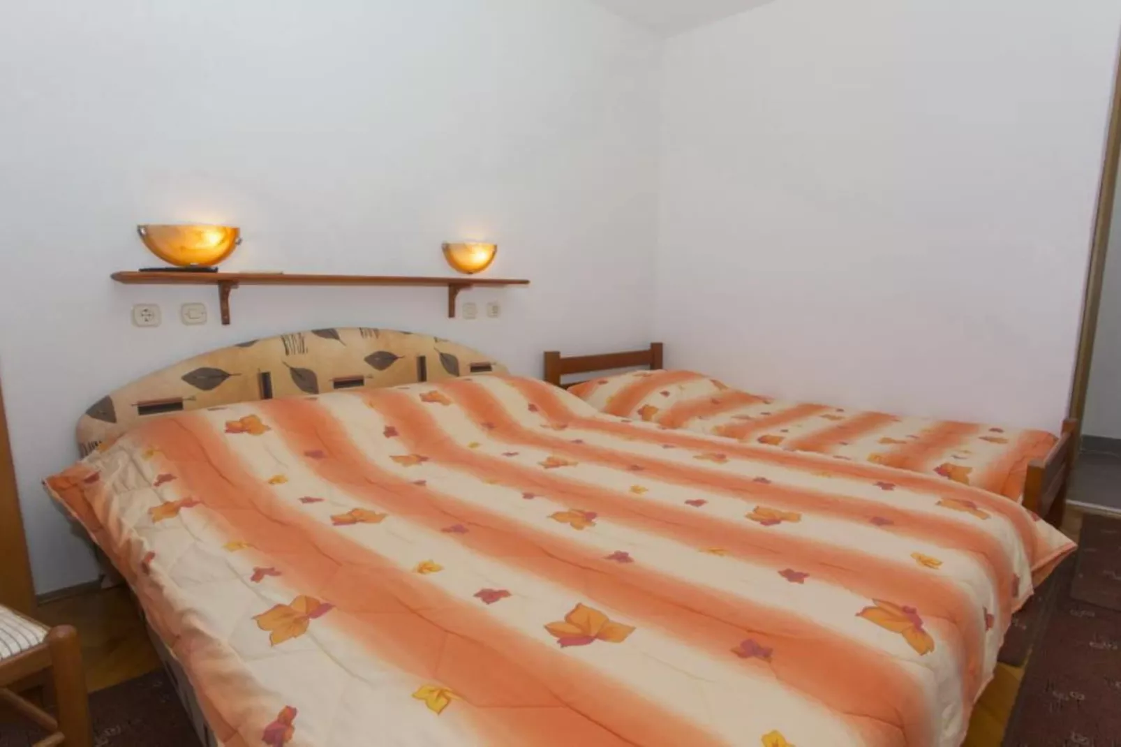 Triple Room with Private Balcony (A3)-Slaapkamer