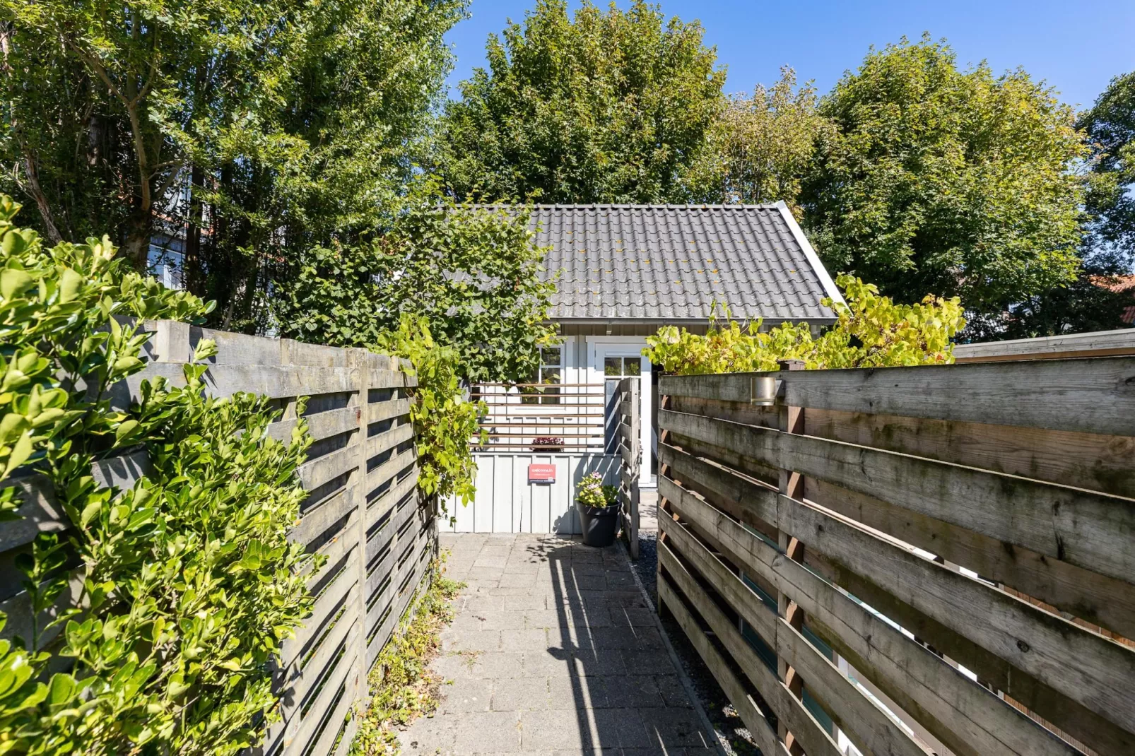 Lijsterhofstraat 13 - Knusse vakantiewoning nabij strand en centrum-Buitenkant zomer