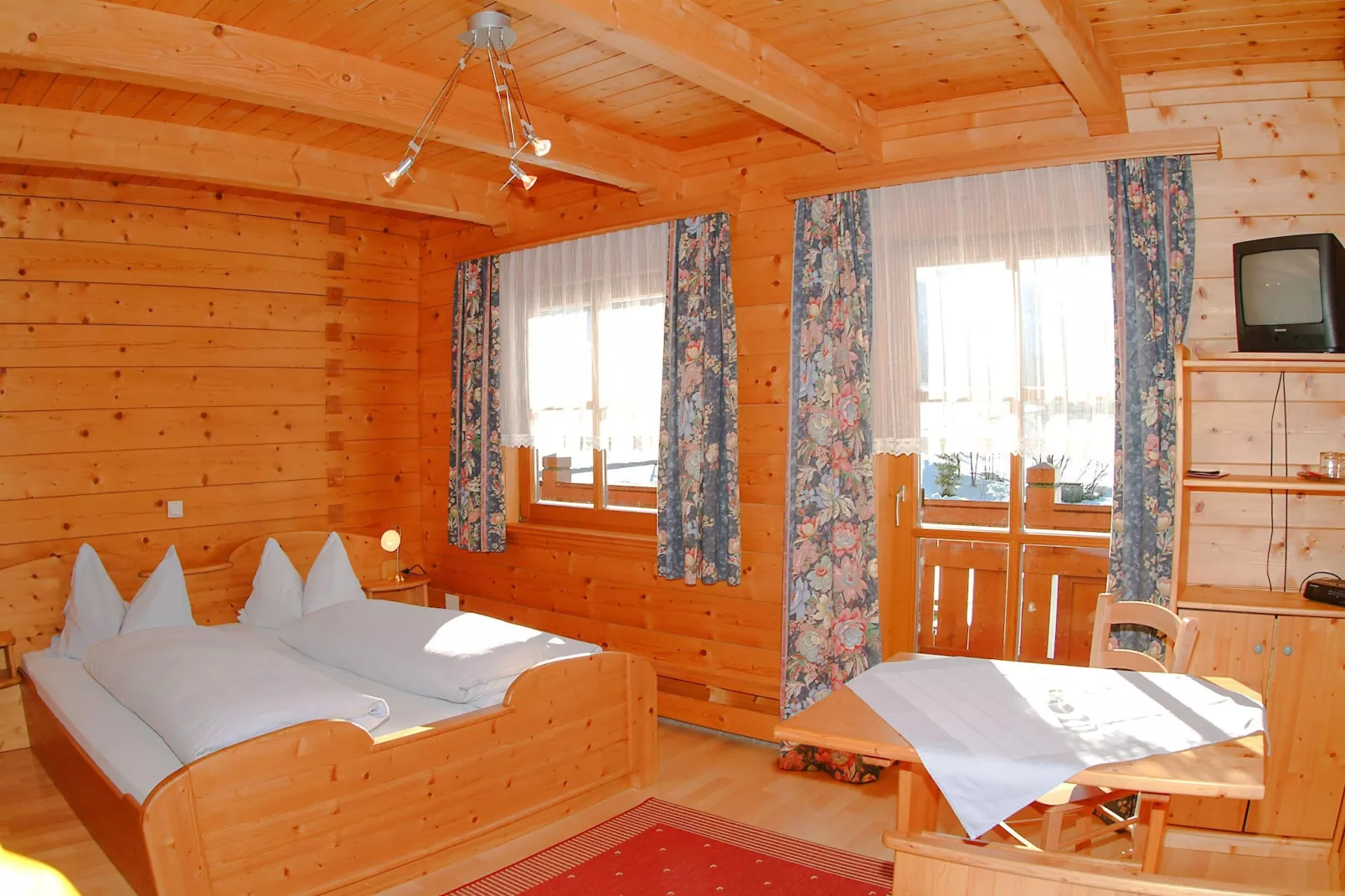 Appartment Holzblockhaus-Slaapkamer