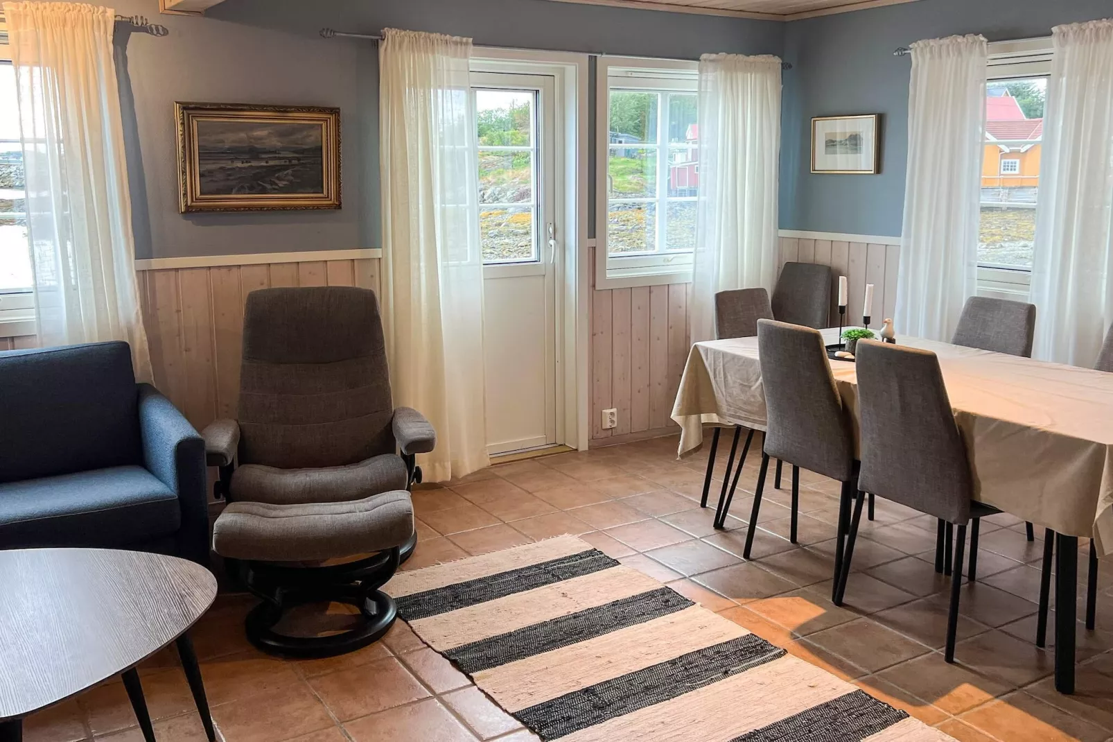 Zeezicht met boten en vissen