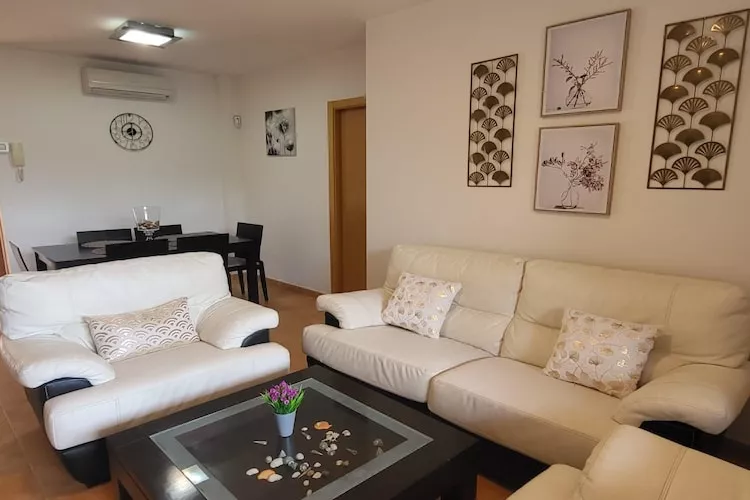 CT 347 AL - Faro's Gardenapartment - Valle del Este-Woonkamer