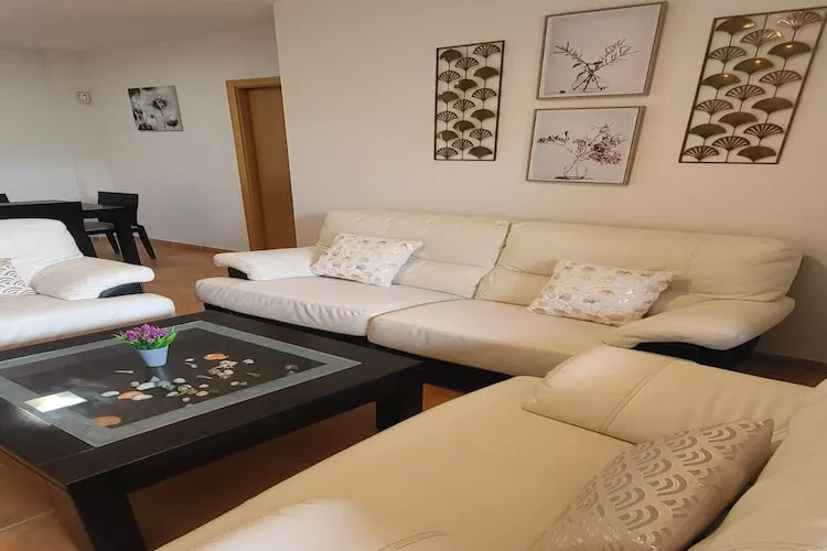 CT 347 AL - Faro's Gardenapartment - Valle del Este-Woonkamer