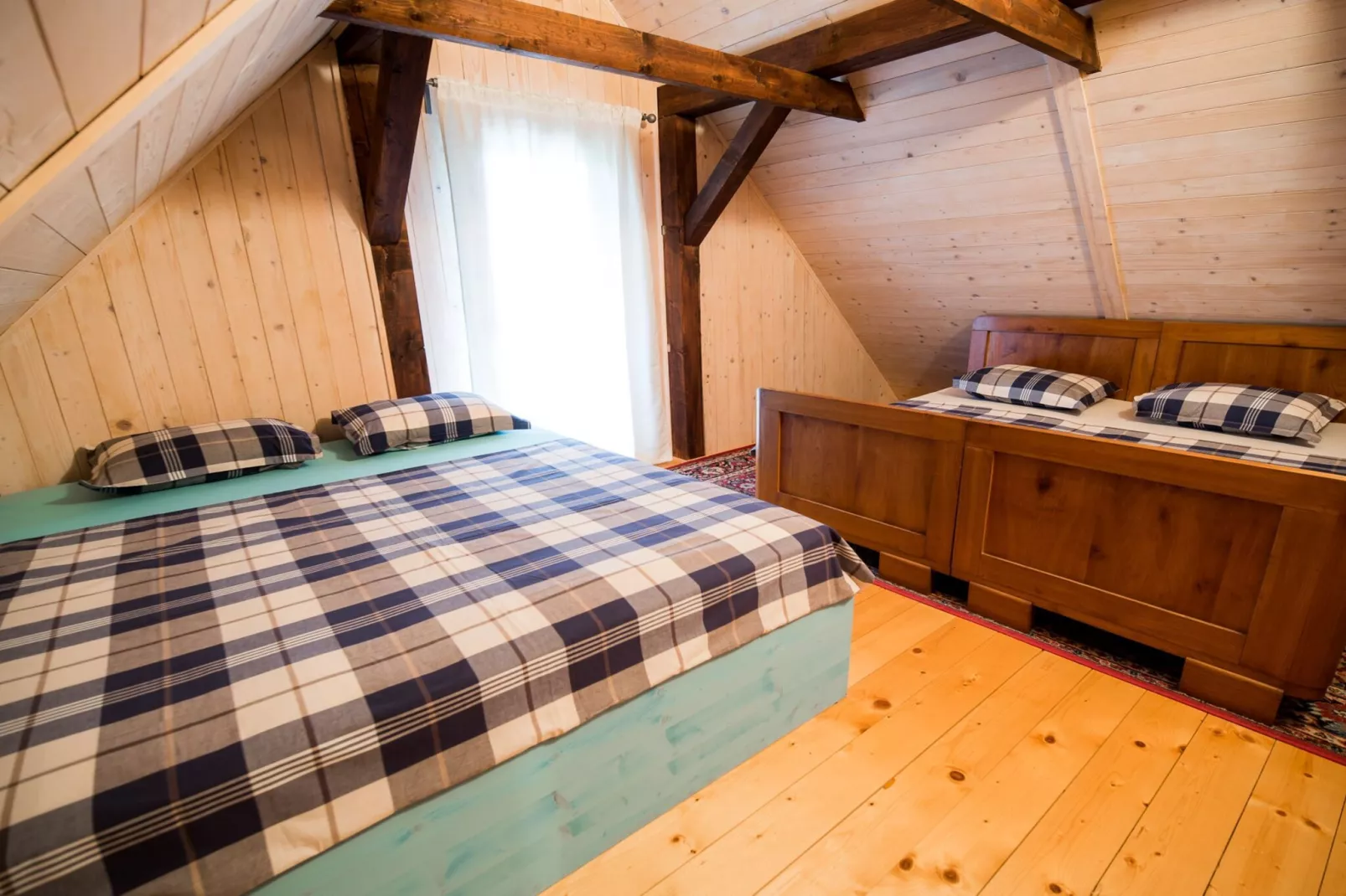 Serene Rustic Haven Holiday Home with Sauna - Two Bedroom Holiday Home with Sauna-Slaapkamer