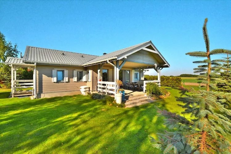 Dom wakacyjny w Oświnie-Buitenkant zomer